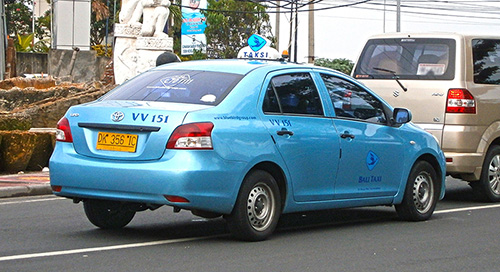 A Blue Bird taxi in Indonesia, known for its distinct blue colour.